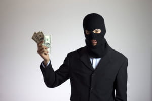 Fraudster with money